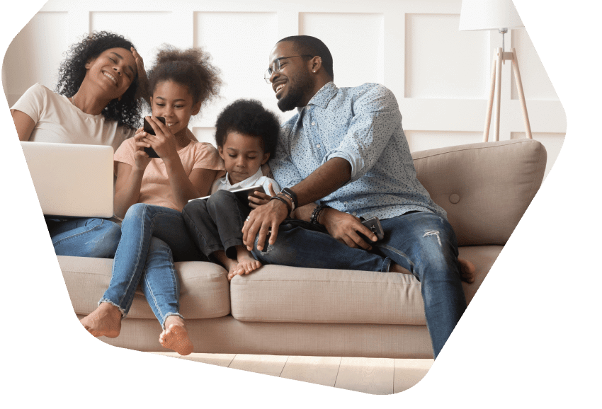 Family at home using their devices 