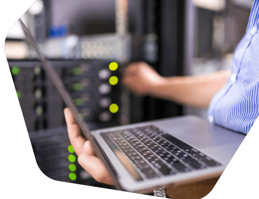 Man and woman viewing office servers
